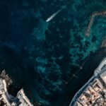 aerial view of white boat on sea during daytime